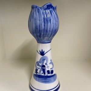 Delft Blue ceramic tulip-shaped candlestick with windmill decoration.